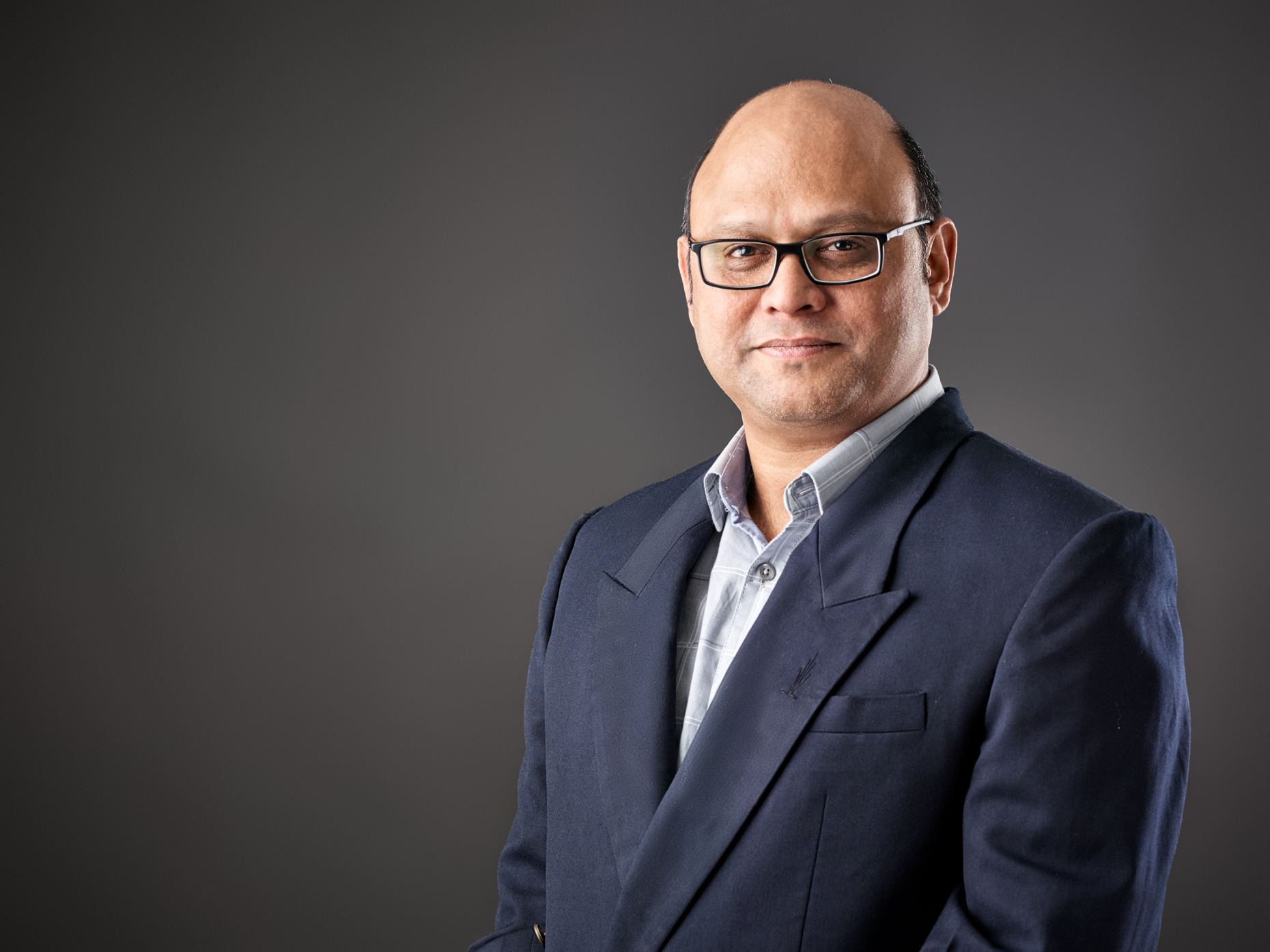 Creative headshot of Kalyan Seshu, Isima corporate